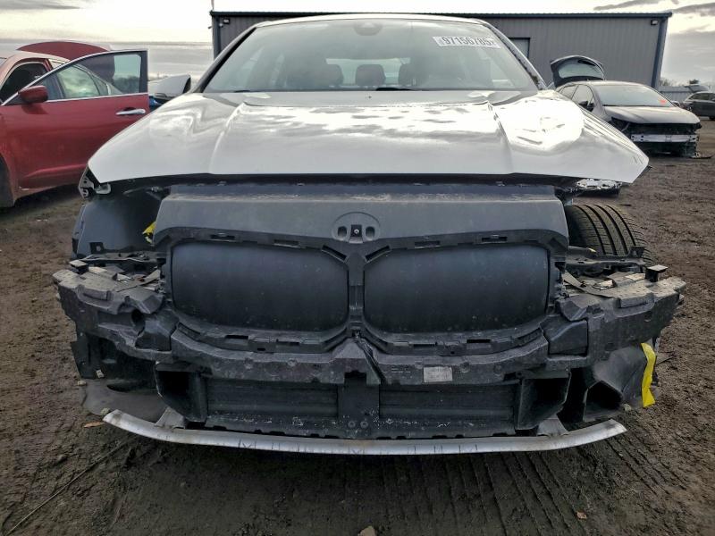 Photo 5 from auction – 2022 BMW 228XI with VIN WBA73AK00N7K39326