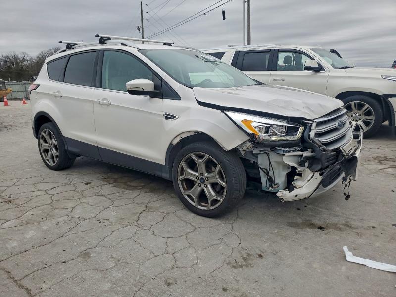 Photo 4 from auction – 2017 FORD ESCAPE TIT with VIN 1FMCU0JD1HUD39272