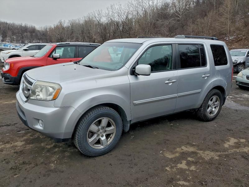 HONDA PILOT EXL 2010 with VIN 5FNYF4H66AB007460 - Photo from auction