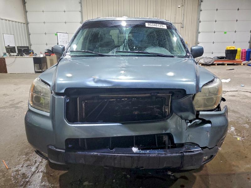 Photo 5 from auction – 2006 HONDA PILOT EX with VIN 2HKYF18566H561533