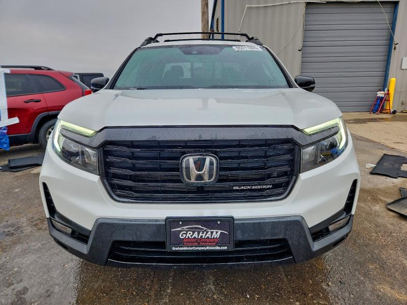 Photo 5 from auction – 2022 HONDA RIDGELINE with VIN 5FPYK3F84NB030484