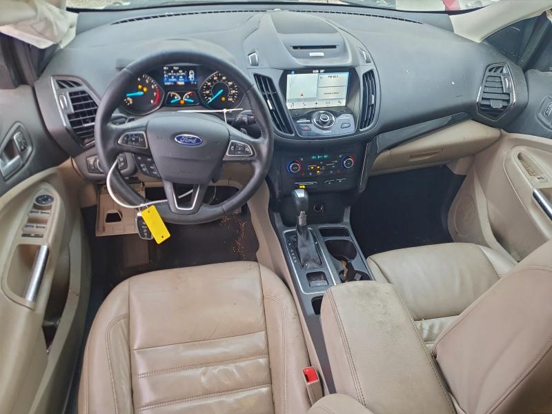 Photo 8 from auction – 2017 FORD ESCAPE TIT with VIN 1FMCU0J99HUB00855