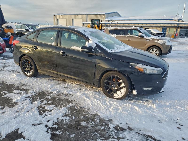 Photo 4 from auction – 2016 FORD FOCUS SE with VIN 1FADP3F24GL214267