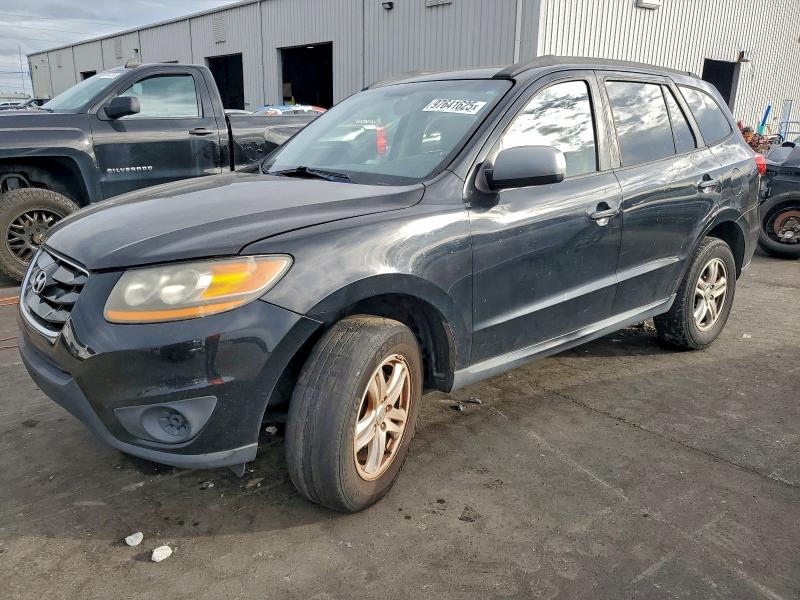 HYUNDAI SANTA FE 2010 with VIN 5NMSG3AB2AH338555 - Photo from auction