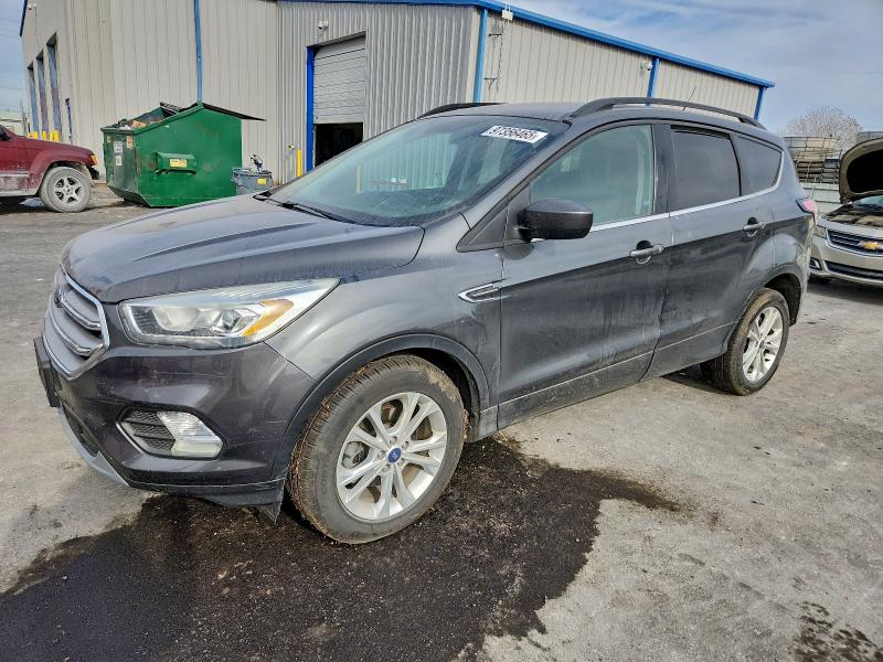 FORD ESCAPE SE 2017 with VIN 1FMCU0GD4HUC66079 - Photo from auction
