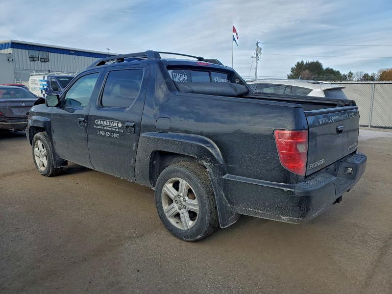 Photo 2 from auction – 2011 HONDA RIDGELINE with VIN 5FPYK1F54BB501152