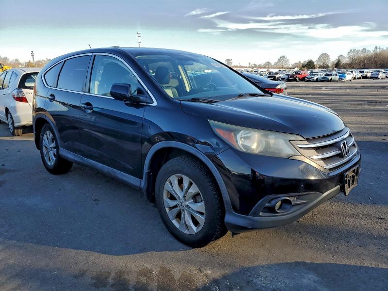 Photo 4 from auction – 2014 HONDA CR-V EX with VIN 5J6RM4H50EL080791