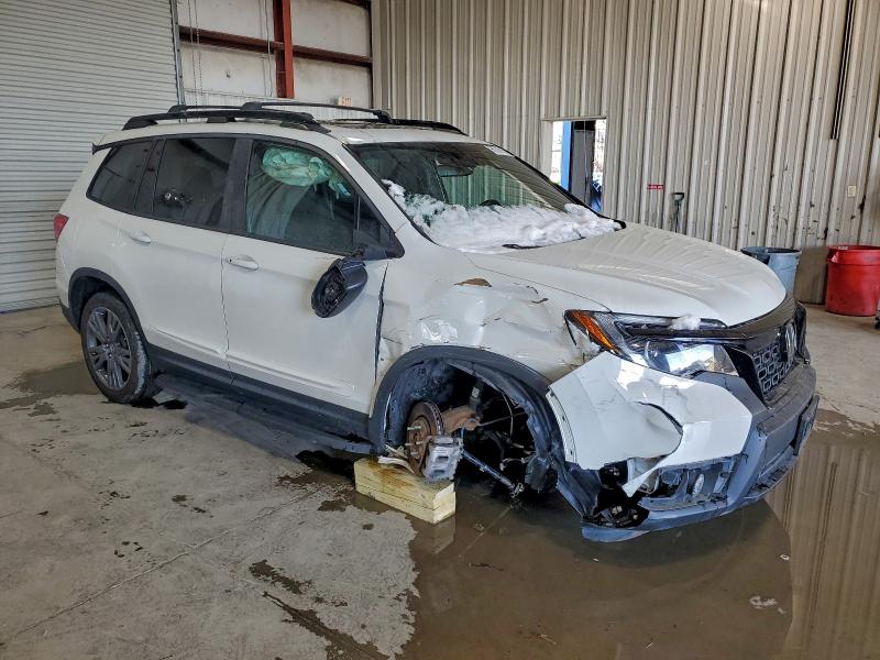 Photo 4 from auction – 2021 HONDA PASSPORT E with VIN 5FNYF8H5XMB014673