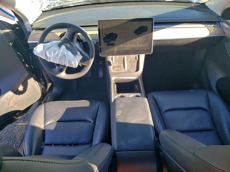 Photo 8 from auction – 2022 TESLA MODEL Y with VIN 7SAYGDEEXNF567788
