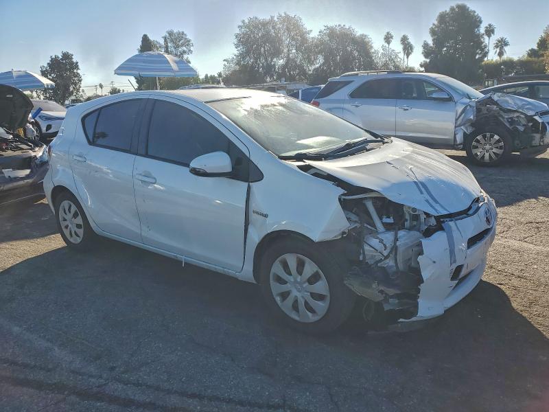 Photo 4 from auction – 2014 TOYOTA PRIUS C with VIN JTDKDTB31E1069285
