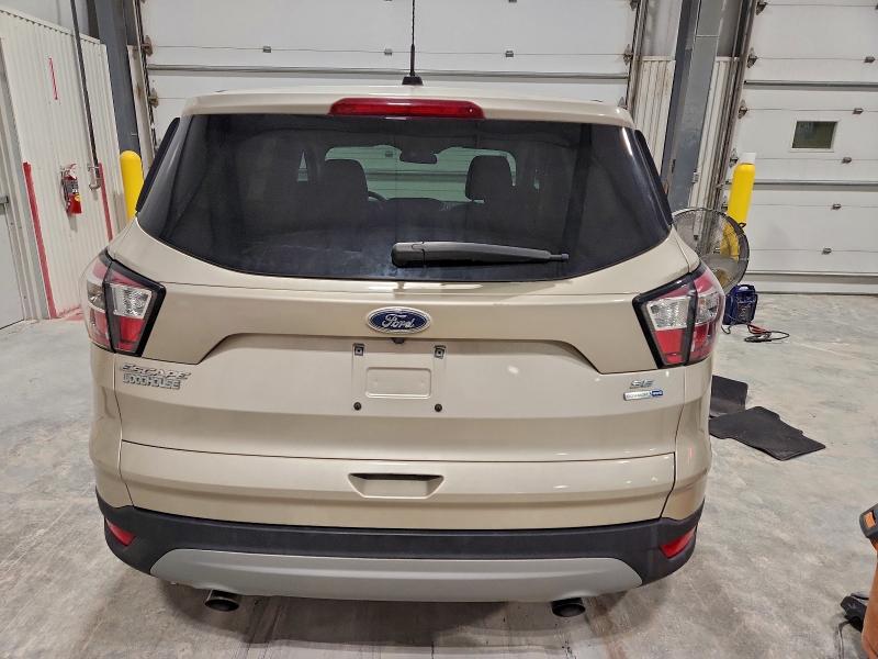 Photo 6 from auction – 2017 FORD ESCAPE SE with VIN 1FMCU9GD7HUE08025