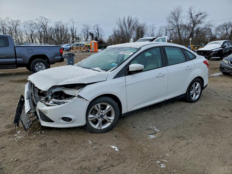 FORD FOCUS SE 2014 with VIN 1FADP3F2XEL102490 - Photo from auction