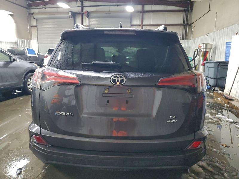 Photo 6 from auction – 2018 TOYOTA RAV4 LE with VIN 2T3BFREV7JW750962
