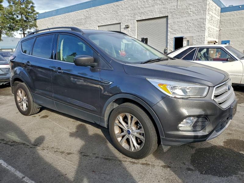 Photo 4 from auction – 2018 FORD ESCAPE SE with VIN 1FMCU9GD1JUB28073