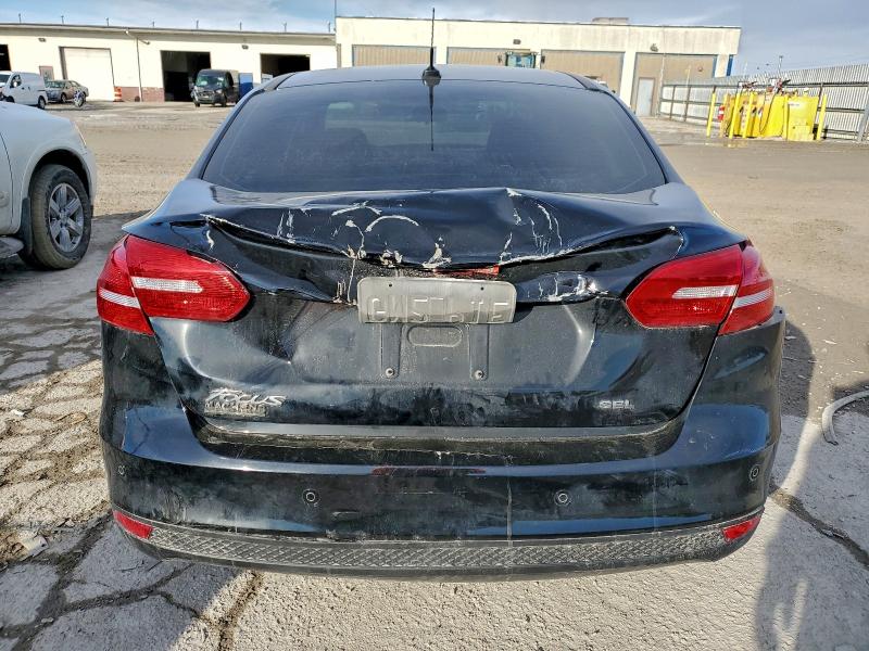 Photo 6 from auction – 2017 FORD FOCUS SEL with VIN 1FADP3H25HL342953