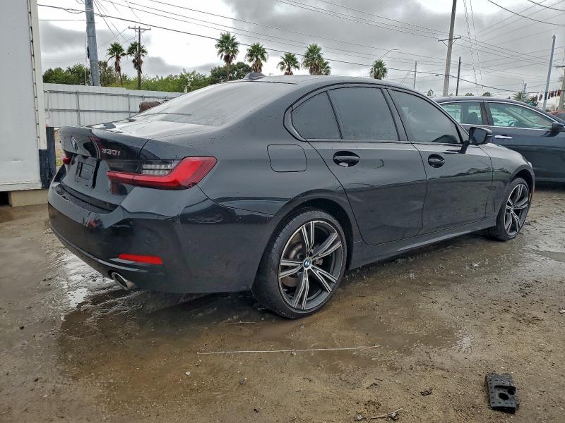 Photo 3 from auction – 2023 BMW 330XI with VIN 3MW89FF02P8D43425