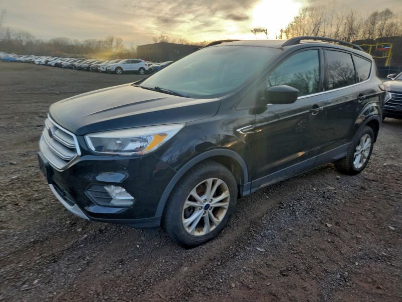 FORD ESCAPE SE 2018 with VIN 1FMCU9GD3JUC25422 - Photo from auction