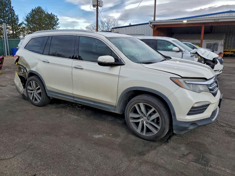 Photo 4 from auction – 2017 HONDA PILOT ELIT with VIN 5FNYF6H04HB053435