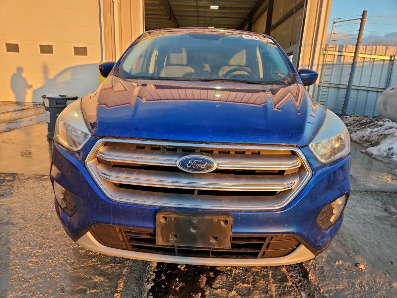 Photo 5 from auction – 2017 FORD ESCAPE with VIN 1FMCU9GD6HUC79064