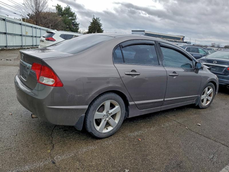Photo 3 from auction – 2011 HONDA CIVIC LX with VIN 19XFA1F57BE019865