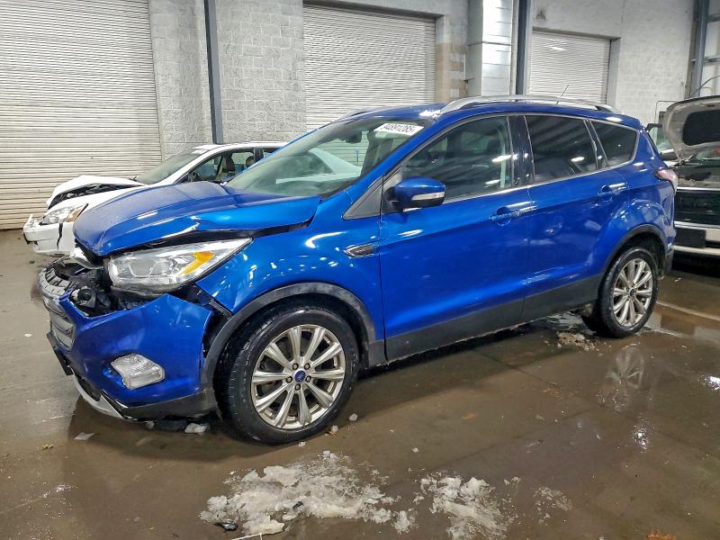 FORD ESCAPE TIT 2017 with VIN 1FMCU9JD8HUF05338 - Photo from auction