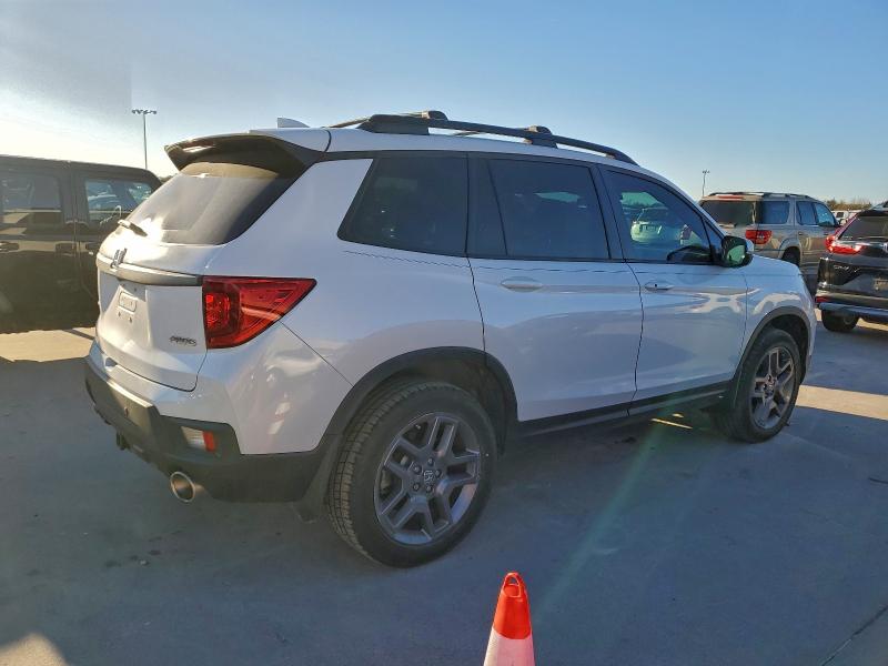 Photo 3 from auction – 2023 HONDA PASSPORT E with VIN 5FNYF8H55PB035497