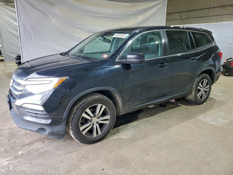 HONDA PILOT EXL 2016 with VIN 5FNYF6H55GB049081 - Photo from auction