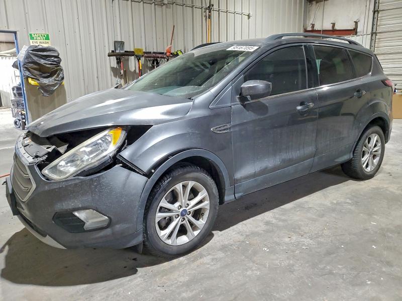 FORD ESCAPE SE 2018 with VIN 1FMCU9GD4JUB17147 - Photo from auction