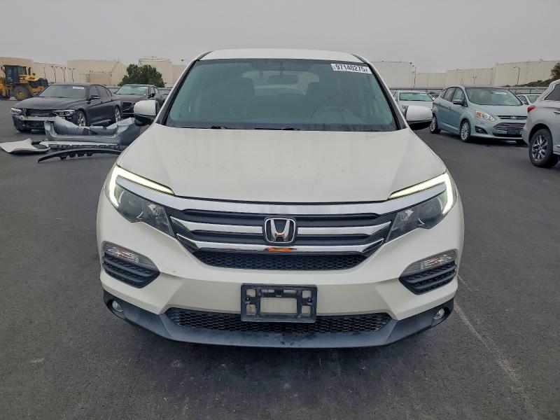 Photo 5 from auction – 2017 HONDA PILOT EX with VIN 5FNYF6H38HB062469