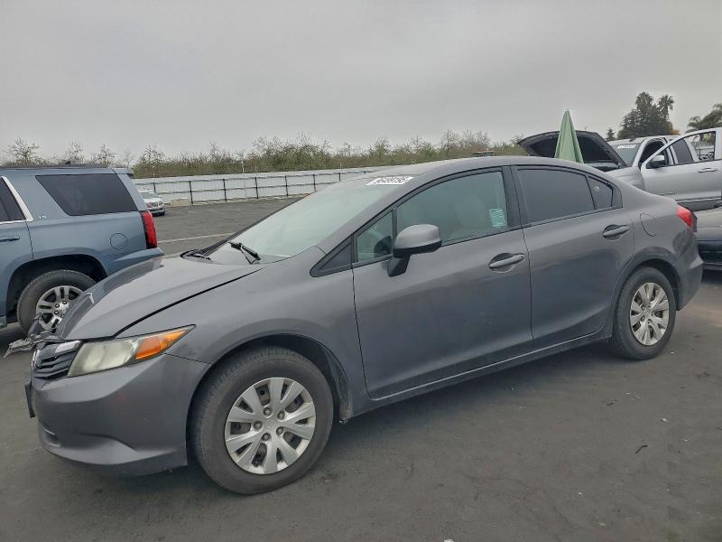 HONDA CIVIC LX 2012 with VIN 2HGFB2E55CH572610 - Photo from auction