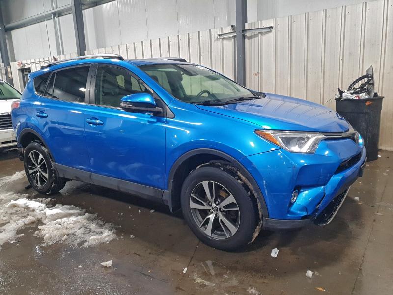 Photo 4 from auction – 2017 TOYOTA RAV4 XLE with VIN JTMRFREV9HJ109058