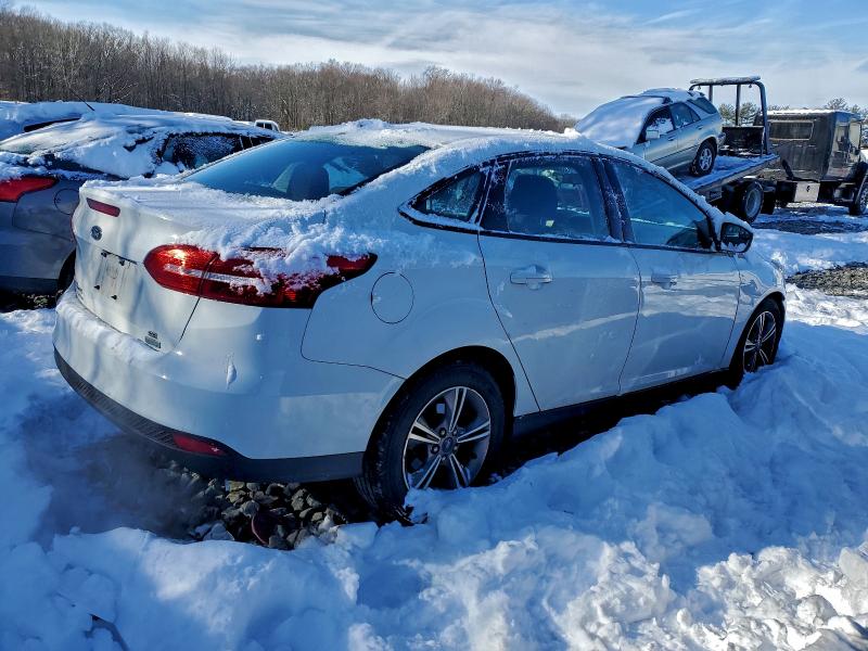 Photo 3 from auction – 2018 FORD FOCUS SE with VIN 1FADP3FEXJL232077