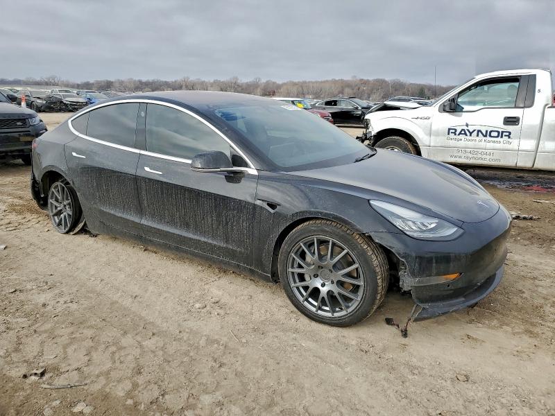 Photo 4 from auction – 2018 TESLA MODEL 3 with VIN 5YJ3E1EBXJF144253