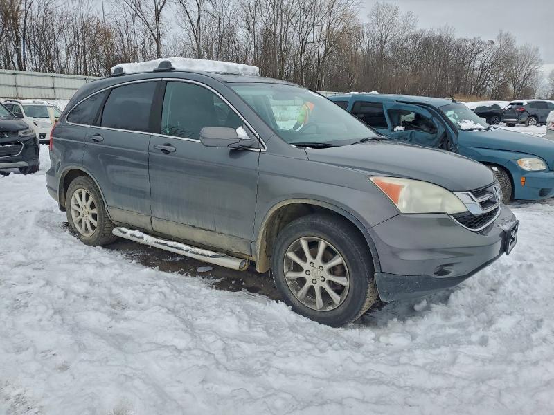 Photo 4 from auction – 2011 HONDA CR-V EXL with VIN 5J6RE4H73BL801941