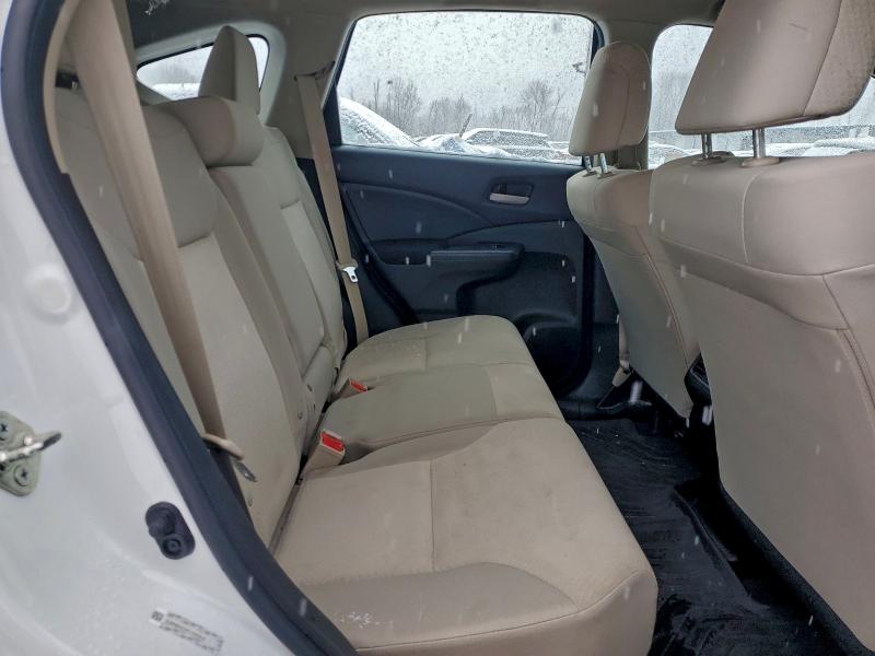 Photo 11 from auction – 2015 HONDA CR-V LX with VIN 5J6RM4H39FL040435