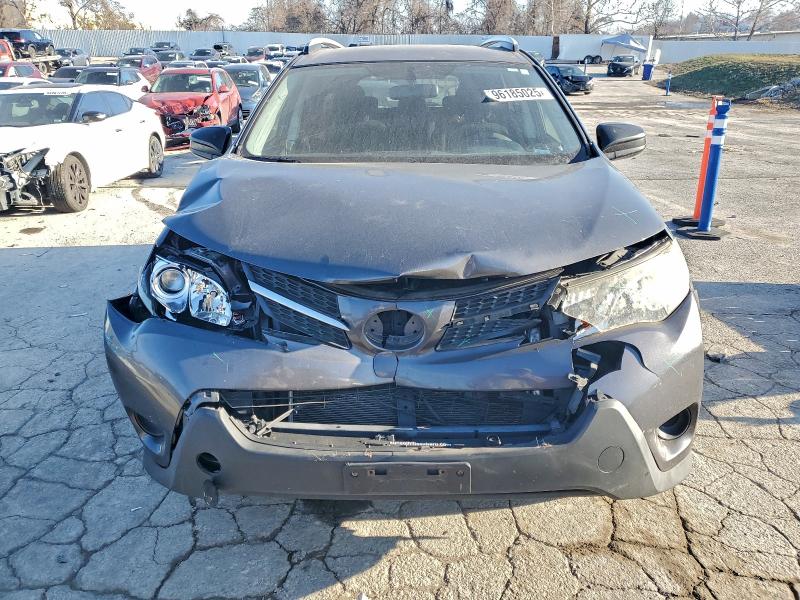 Photo 5 from auction – 2015 TOYOTA RAV4 LE with VIN JTMBFREV7FJ050736