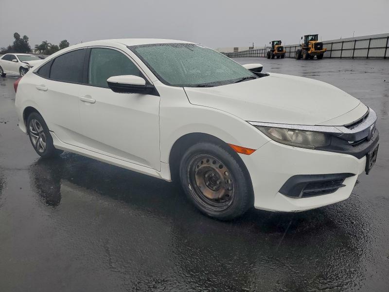 Photo 4 from auction – 2017 HONDA CIVIC LX with VIN 19XFC2F54HE206344