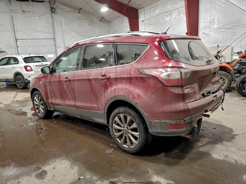 Photo 2 from auction – 2017 FORD ESCAPE TIT with VIN 1FMCU9JD1HUD70946