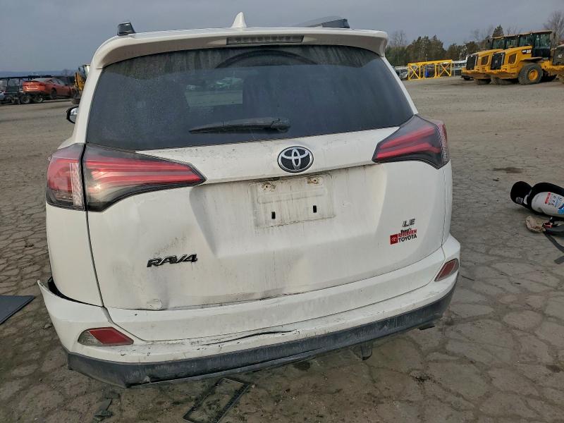 Photo 6 from auction – 2017 TOYOTA RAV4 LE with VIN JTMZFREV2HJ140572