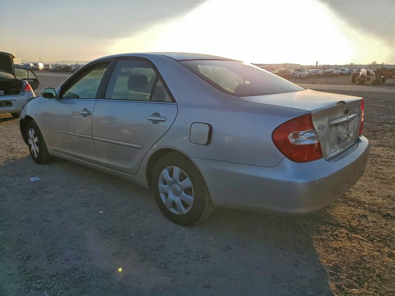 Photo 2 from auction – 2003 TOYOTA CAMRY LE with VIN JTDBE32K130228345