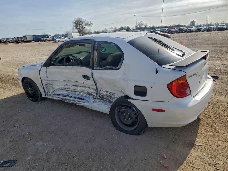 Photo 2 from auction – 2004 HYUNDAI ACCENT GL with VIN KMHCG35C04U285872