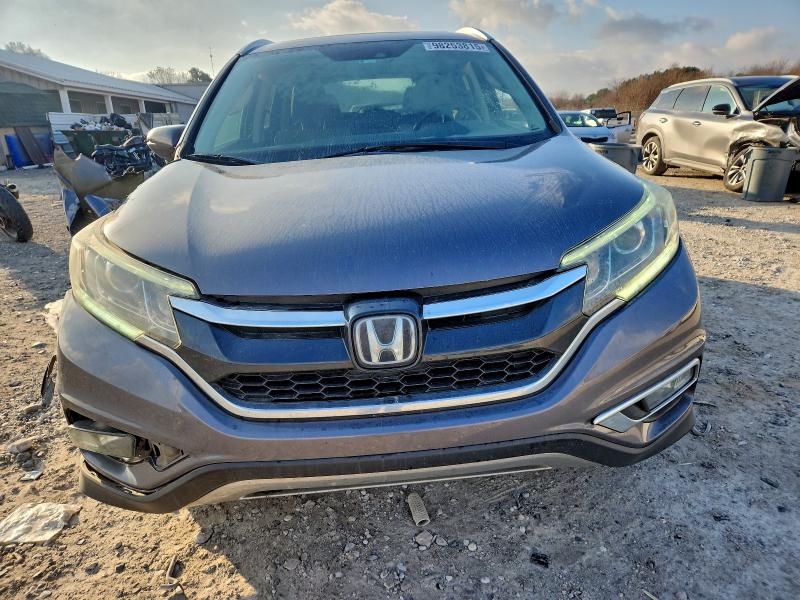 Photo 5 from auction – 2015 HONDA CR-V TOURI with VIN 5J6RM3H94FL022133