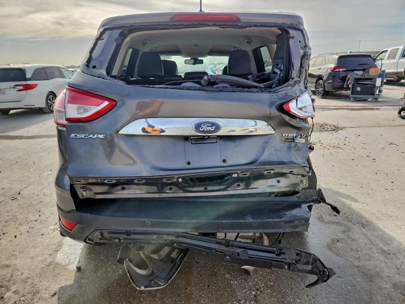 Photo 6 from auction – 2014 FORD ESCAPE TIT with VIN 1FMCU0J97EUB27144