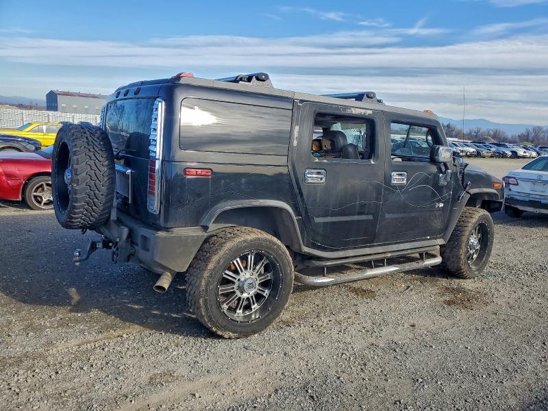 Фото 3 с аукциона – 2004 HUMMER H2 с VIN 5GRGN23U04H119666