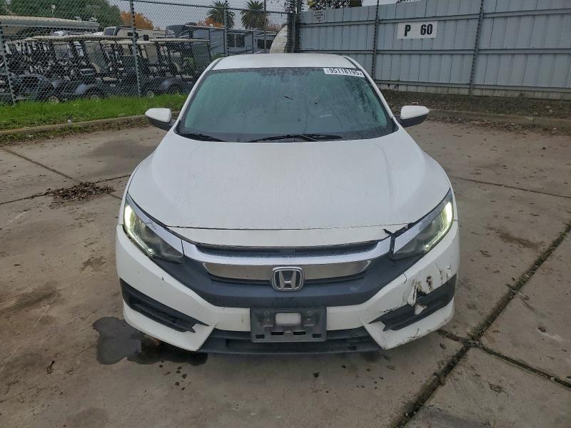 Photo 5 from auction – 2016 HONDA CIVIC LX with VIN 2HGFC2F50GH563119