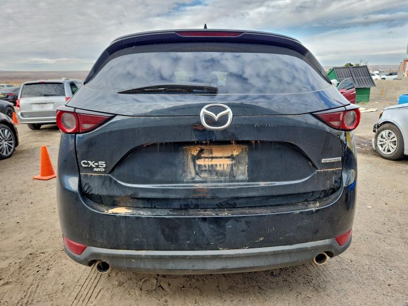 Photo 6 from auction – 2021 MAZDA CX-5 TOURI with VIN JM3KFBCM3M1496565