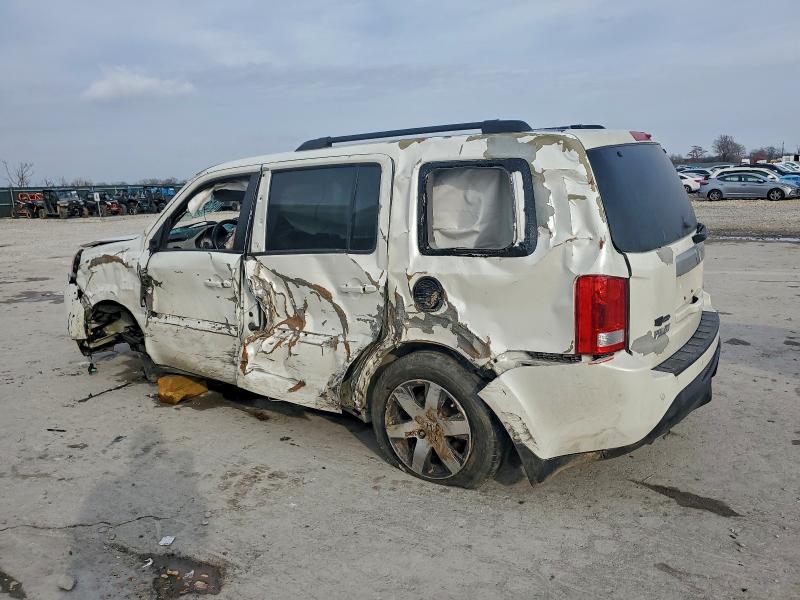 Photo 2 from auction – 2013 HONDA PILOT TOUR with VIN 5FNYF4H90DB018971