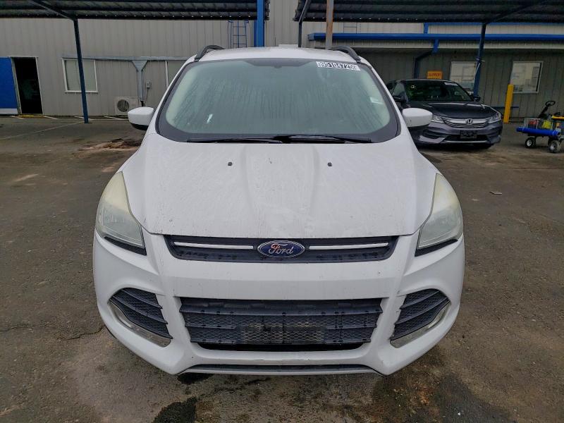 Photo 5 from auction – 2016 FORD ESCAPE SE with VIN 1FMCU0GX3GUA99836