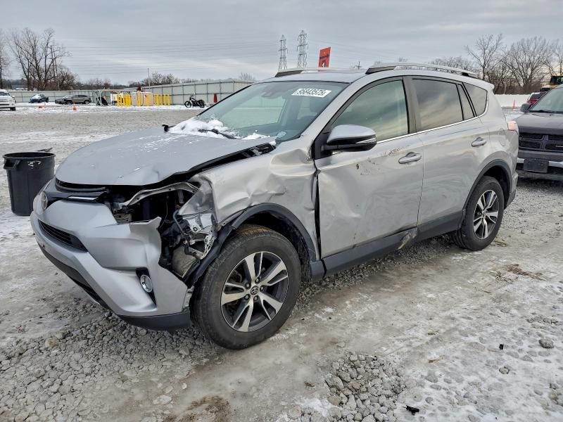 TOYOTA RAV4 ADVEN 2018 with VIN 2T3RFREV3JW697658 - Photo from auction