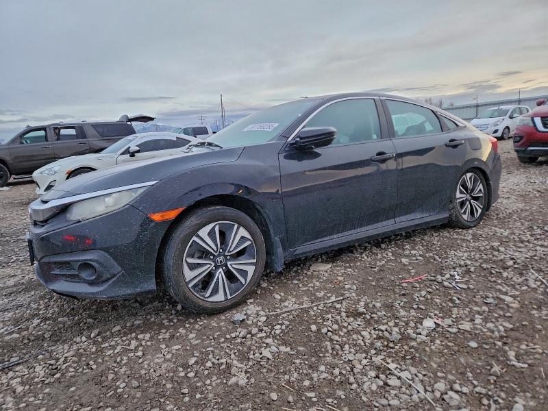 HONDA CIVIC EX 2016 with VIN 2HGFC1F32GH658144 - Photo from auction